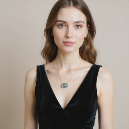 Emerald Interlock Elegance Necklace